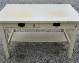 Signed L & JG Stickley 2 Drawer Desk antique mission oak Arts & Crafts Movement measures approximately 29.4 inches high x 48.2 inches wide x 30.2 inches deep, Handcraft clamp decal in right inside drawer bottom, wooden dowel pins, arched corbels, figure eight underside screw grommets, we have not removed top edge paint to see if splined but since an early decal we suspect it may be.