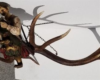 Black Forest Carving 7 of 20, hunter elk horn mermaid for merman hanging ceiling fixture sculpture, painted wood with metal chain, 18 x 47 x 47 inches excluding chain. Provenance: This German Austrian Swiss Bavarian Alpine figural carving is one of twenty in the sale from the estate of a New England lifetime collector national business owner retired to central Florida.