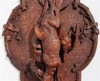 Black Forest Carving 10 of 20, ram hanging game relief plaque, 34 x 21 x 4.5 inches, eyes appear to be inset glass. Provenance: This German Austrian Swiss Bavarian Alpine figural carving is one of twenty in the sale from the estate of a New England lifetime collector national business owner retired to central Florida.