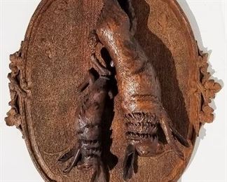 Black Forest Carving 12 of 20, hare rabbit relief game hunt plaque, the smaller with glass eyes, 30 x 20 x 3 inches. Provenance: This German Austrian Swiss Bavarian Alpine figural carving is one of twenty in the sale from the estate of a New England lifetime collector national business owner retired to central Florida.