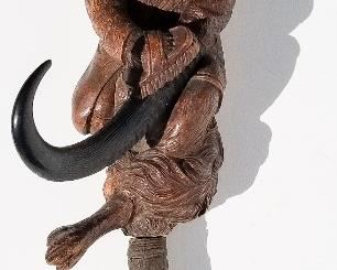 Black Forest Carving 17 of 20, fox in suit double hat rack coat hook, 14 x 4.5 x 4.5 inches overall. Provenance: This German Austrian Swiss Bavarian Alpine figural carving is one of twenty in the sale from the estate of a New England lifetime collector national business owner retired to central Florida.