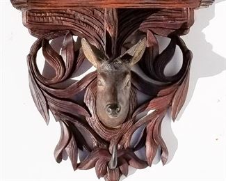 lack Forest Carving 20 of 20, deer stag shelf horn coat hook hat rack, painted eyes, 9 x 9.4 x 5.4 inches. Provenance: This German Austrian Swiss Bavarian Alpine figural carving is one of twenty in the sale from the estate of a New England lifetime collector national business owner retired to central Florida.