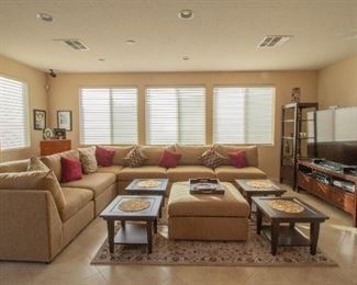sectional with 4 cocktail table, ottoman and pier entertainment center - $3400. $2000 for just sectional with ottoman and pillows