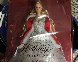 Barbie $10 - will sell 2 for $15 (golden and red) 