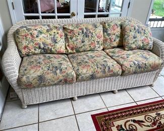 ITEM #60 Vintage heavy wicker sleeper sofa and matching chair with ottoman, $275