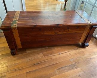 ITEM #13 Large cedar chest with copper strapping, front right foot needs reattached and it is an easy fix, $75
