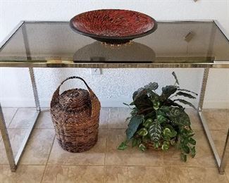 #63 Basket - $18   Faux Plant in basket - $12.50   The red bowl on top of console is in previous photo and the glass console is in a photo toward the beginning of the photo list.