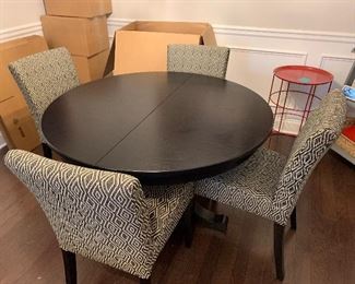 $350-Crate and Barrel Round Table with Leaf- Without leaf: 45” diameter; With Leaf: 60” oval, 29” tall