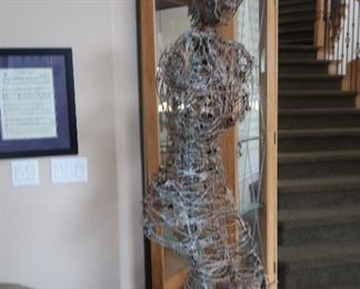 Art-wire in the shape of a woman
