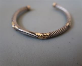 Sterling Silver and 14K bracelet.  For the benefit of the Salvation Army.