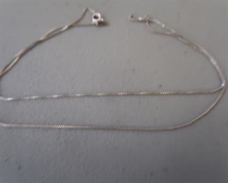 Sterling Silver chain.  For the benefit of the Salvation Army.