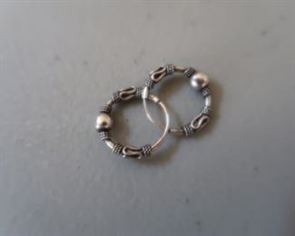 Sterling silver earrings. For the benefit of the Salvation Army.