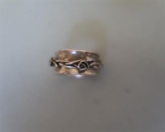 Sterling silver ring. For the benefit of the Salvation Army. I love this too!  It is a chain around the band.