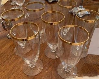 Crystal  wide gold rim goblets  6-1/4 in. high and opening 2-3/8  with smaller gold band below larger band. 1' stem   $8.00-each --  7 available