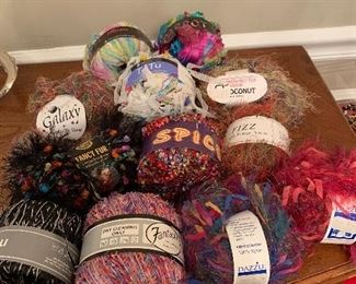 Skeins of knitting and crochet thread (over 100 skeins. Priced. 1$-4$. Must buy in bulk