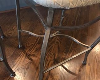 Pair of metal counter chairs with fabric seats