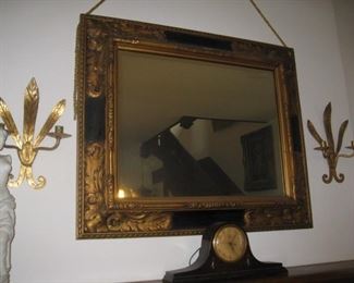 #13- $75. Mantle mirror black and gold frame-plastic