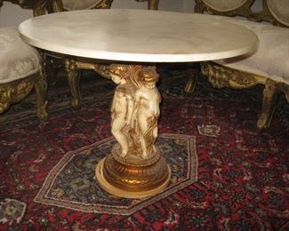 #16- $125. Round putti pedestal table-24"H x 30" diameter
