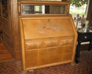 #42-$450. Carved oak slant front desk with mirror