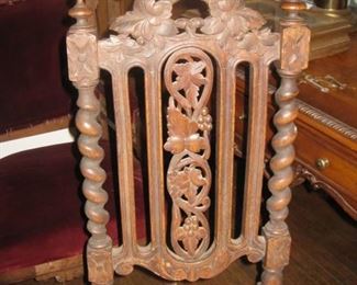 #34-$275. Black Forest carved chair