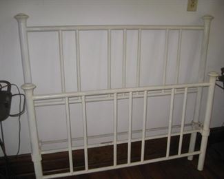#156-$125.Metal bed with metal side rails-52"W (smaller than a full)