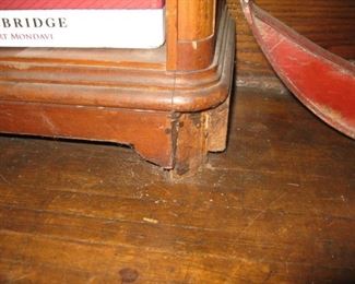 damage to front corner of bookcase