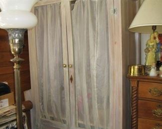 #100-$50. Tall white wardrobe with sheer doors-87"H x 50"W x 21-1/2"D
