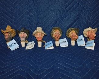 Spit'n'Whittle Bottlestoppers by Chris Hammack