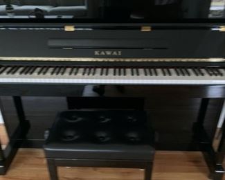 KWAI BLACK LACQUER UPRIGHT PIANO EXCELLENT FINISH AND SOUND. $2650 OBO A GREAT PIANO IF YOU WANT TO LEARN TO PLAY OR HAVE CHILDREN READY TO LEARN OBO