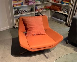 PAIR OR METROPOLITAN ARMCHAIR BRIGHT BURSHED ALUM. RUST COLOR NEW $2648 pair. Excellent condition. Swivel base our price $1250 pair