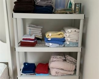 ASSORTED LINENS, TABLE CLOTHS, BLANKETS, IRONS AVAILABLE