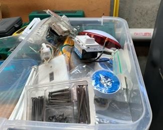 ALL SORTS OF THINGS IN THE BASEMENT WORK AREA INCLUDING HOLIDAY DECOR, SMALL TOOLS, PAINTING ITEMS.