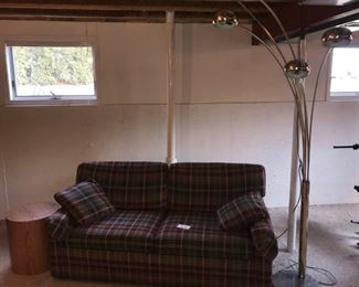 73 Inch Sleeper Sofa, Carpet, Table, and Lamp