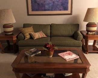 A firm Sleeper sofa, a Commercial Brand in Excellent condition. Green and gold, $250. Stucco Pottery Mid-Century matching table lamps with 3-way switches. $40ea/ $70 Set. Side tables and coffee table also match the entry or sofa table in another picture. This completes a set of Four (4) pieces. Tabletops are Beveled Glass, SET $275. Picture on wall is a Matisse print measuring 58" by 42" height. It is large. Make Offer