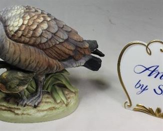 Andrea by Sadek Canadian Goose w/ Duckling Figurine (5.75”H x 8”L x 4”D) Shown with a Porcelain “Andrea by Sadek” Sign