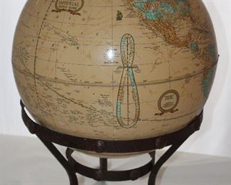 George F Cram Co: Cram’s Imperial Globe resting on a Wrought Iron Stand