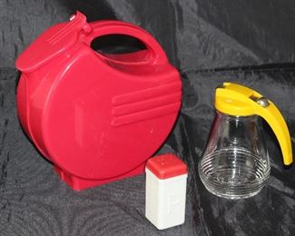 Depression Era Art Deco Red Plastic Pitcher Shown with Vintage Yellow Plastic Lid Glass Syrup Pitcher and Red and White Plastic Pepper Shaker
