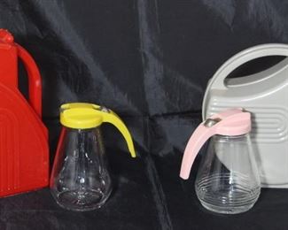 Depression Era Art Deco Plastic Pitchers: Tall Red and The Burroughs Co. Gray Pitcher with Vintage Yellow Plastic Lid and Pink Lid Glass Syrup Pitchers