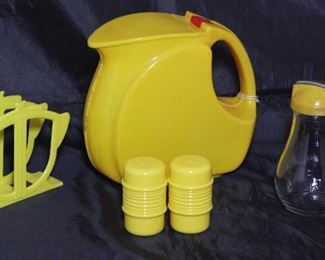 Depression Era Art Deco Yellow Plastic Pitcher Shown with Vintage Rogers Products Yellow Plastic Napkin Holder, ABCD Shakers and Yellow Plastic Lid Glass Syrup Pitcher