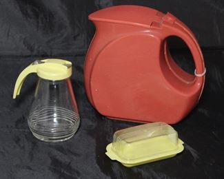 Wata-Kanta Depression Era Art Deco Terracotta Red Plastic Pitcher Shown with Vintage Yellow Plastic Lid Glass Syrup Pitcher and The Burroughs Co. Clear Plastic Lid Yellow Butter Tray