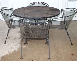 Black Metal Mesh Round Patio Table (42”W x 28.5”H) and 4 Captain Chairs