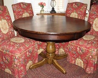 Custom Upholstered Parson Chairs shown with an Antique Round Pedestal Table (48"D) and Round Braided wool Rug. Ant