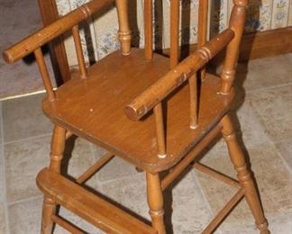 Nice old high chair for dolls or decor (not for babies!). It is 14 inches wide 38 inches tall. $20.00