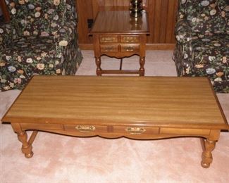 Contemporary coffee table. Good condition. Measures 15 inches tall and the top measures 20in by 52in. $45.00