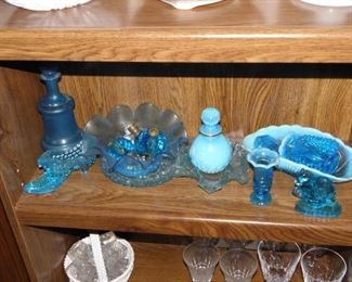 12 pieces of blue glass. A few may have a chip or wear. $25.00 for all.
