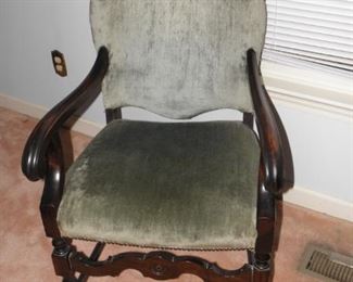 Nice old velvet chair with fading and wear. It measures 24 inches wide and 40 inches tall. $55.00