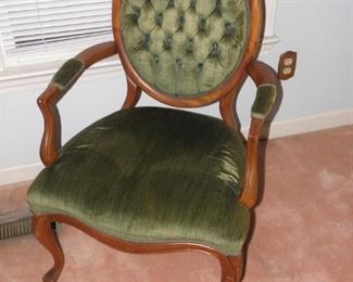 Nice tufted velvet shield back oak chair. Good condition with normal wear from age. It measures 24 inches wide and 38 inches tall. $75.00