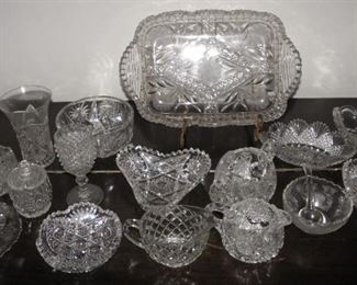 17 piece clear cut and pressed glass lot. All pieces are in good condition.  $65.00 for all.