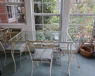 Vintage glass top table and chairs $150.00