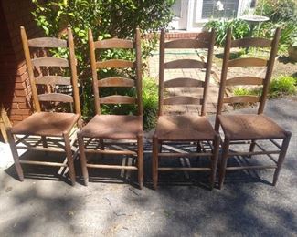 Vintage 4 ladder back wood chairs with rush seats. Set $85.00